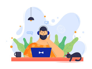 Fototapeta premium A man is working from home with laptop and headphones in his head, listen songs with comfort working. Beautiful abstract background concept of study and working from home.