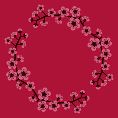 Pink cherry blossoms on a tree branch arranged in a wreath on square raspberry colour background