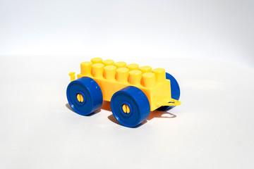 Naklejka premium children's old toy car on a white background