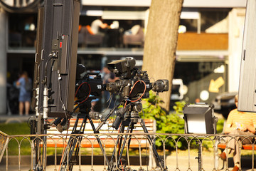 Report for television on a professional video camera. Release of news to the public. High-tech video equipment for the production of high-quality content. Rear view of the camera