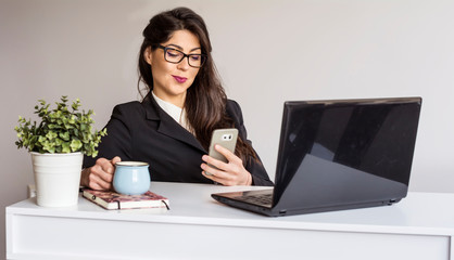 Happy Young Woman in front of the Laptop ,Working from Home