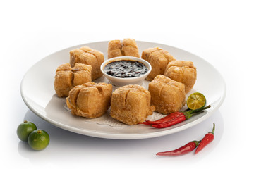 fried tofu with minced beef meet on white porcelain plate white background