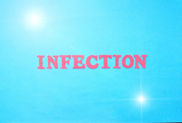 The word infection in red letters on a blue background. The concept of sexually transmitted and respiratory infections, rotavirus, hepatitis