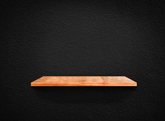 Light wood shelves on black wall texture in loft Style  background with clipping path. Design for wallpaper