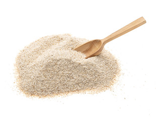 Fototapeta na wymiar barley flour with a wooden spoon on a white background