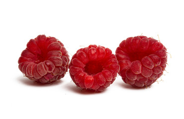 ripe raspberries isolated