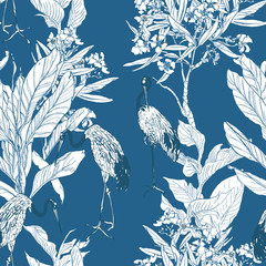 Seamless Pattern Chinese Cranes in Oleander and Tropical Plants on Blue Background Chinoiserie Oriental Print, Exotic Birds in Blooming Trees Spring Garden White on Blue Background