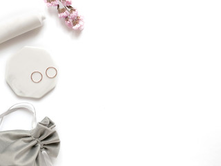 care products cream, plant, towel, rings. bath accessories on white background, top view. Bodycare beauty treatments at home concept, organic products, morning routine