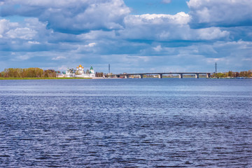 Kostroma, Russia. Ipatievsky monastery on a Sunny summer day against the blue sky from the opposite Bank of the Volga. Golden ring of Russia.