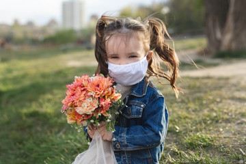 Portrait little girl with face mask protection. Coronavirus, covid-19