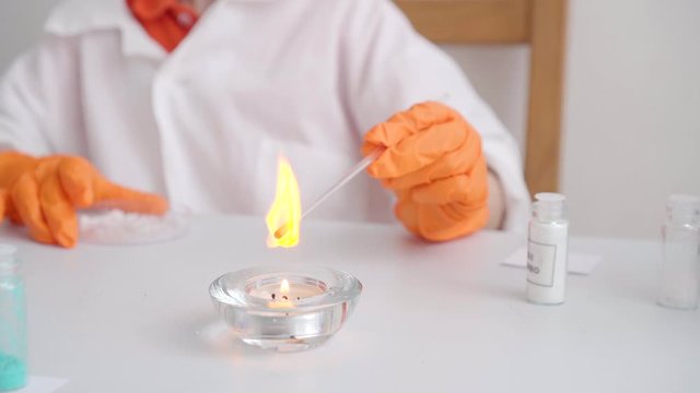 9 years boy delighted with result of experience, sodium salt burns with flashes