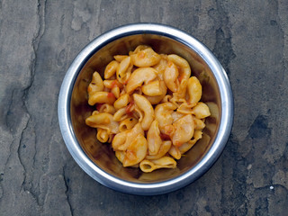 some yellow fresh eatable food put in a steel bowl