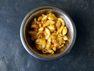 some yellow fresh eatable food put in a steel bowl