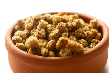 yellow mulberry dried in the plate