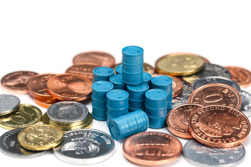 blue oil drums and coins on white background