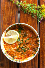 Fish stew in a rustic bowl