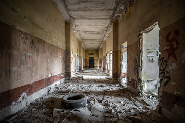 Kyiv, Ukraine - April 2020: Empty corridor of an old abandoned building in the afternoon.