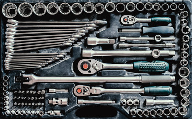 Set of car repair tools in plastic box. Toolkit of various tools in the box. Toolbox. Repair concept.