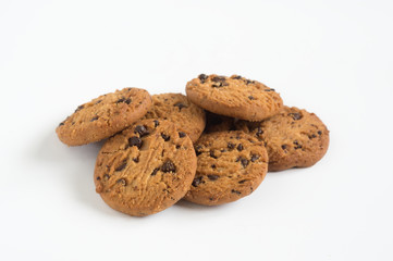 Sweet chocolate chips cookies on white background.