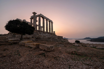 Poseidon temple in Sounion cape at sunset, Greece