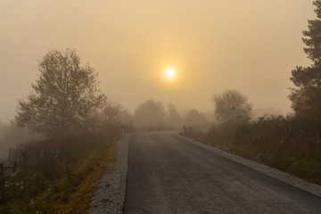 Road with sunrise in Norrthern Hungary