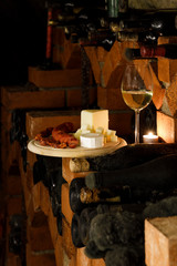 Traditional food in a wine cellar with archival wine, Znojmo region, Southern Moravia, Czech Republic