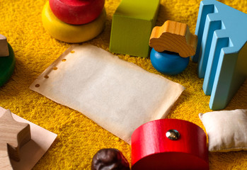 photo for mock up composition for text children's colorful toys with paper and different objects...