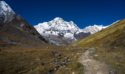 Annapurna South and trekking trail to Annapurna Base Camp at Annapurna Sanctuary in Nepal.