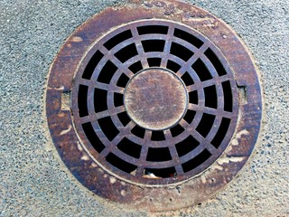 Storm drainage system cover on the road