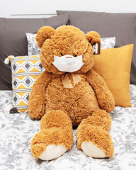 teddy bear with corona virus protection mask