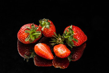 fresh strawberries on a black background