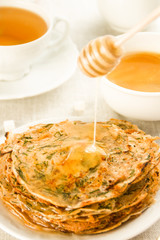 pancakes with honey and tea