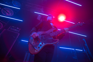 During Coronavirus (COVID-19) Musician plays a mask