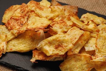 A Step by Step Collage of Making Armenian pita bread, eggs, cheese, spices, sour cream. healthy snack chips. step thirteen.