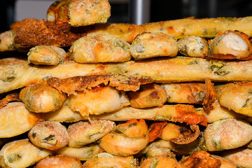 Bread Ahead pastry produce: bread sticks with tomato and olives