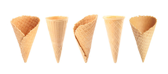Set of empty wafer ice cream cones on white background. Banner design
