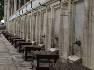 Part of a mosque in istambul, where people get ready to enter in