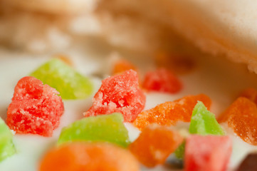 Confectionery multi-colored decorative topping on icing cake.