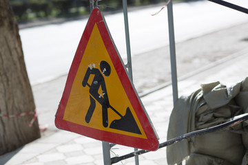 Road sign construction work in city