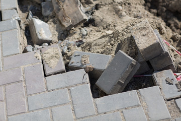 Stacked road tile. Broken surface.