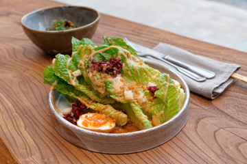 Caesar salad cooked in Asian way - creative fusion food