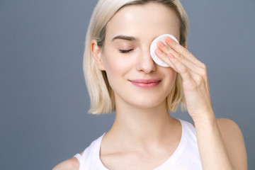 Cotton pad woman remove make up clean skin care beauty healthy skin concept © Utkamandarinka