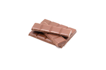 Pieces of chocolate on a white background, isolate. Broken chocolate bar