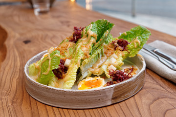 Caesar salad cooked in Asian way - fusion food