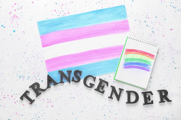 Drawings of transgender and LGBT flags on white background