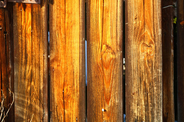 Boards on a wooden fence.