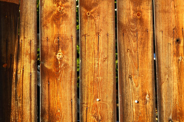 Boards on a wooden fence.