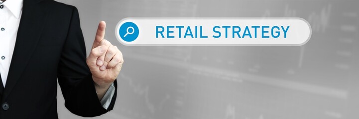 Retail Strategy. Man in a suit points a finger at a search box. The word Retail Strategy is in the search. Symbol for business, finance, statistics, analysis, economy