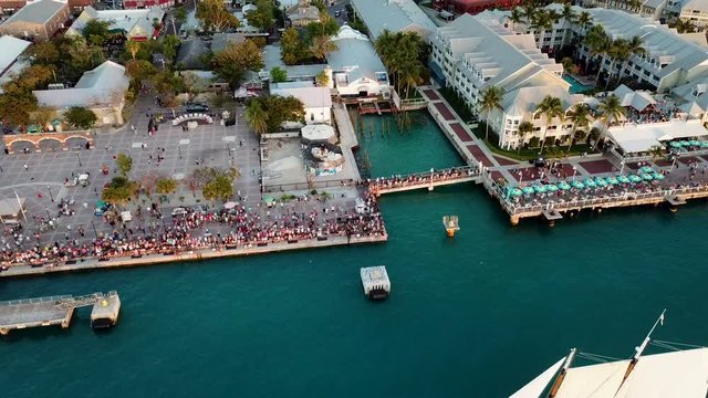 Beautiful 4K aerial drone shot of Mallory Square in Key West, Florida during summer.