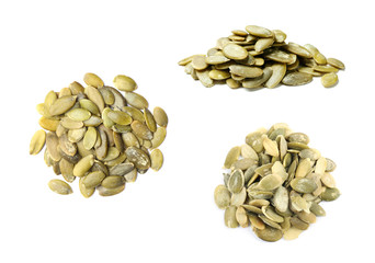 Set of raw pumpkin seeds on white background
